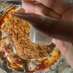 "veal" parm and the cup of dried garlic powder they provide as "extra garlic"