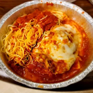 Veal Parmigiano with Angel Hair pasta.   Most of the red in this photo is actually cheese and grease that cooked off the cheese and veal.