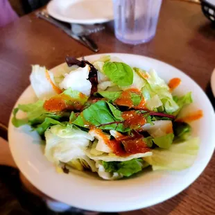 a salad on a white plate