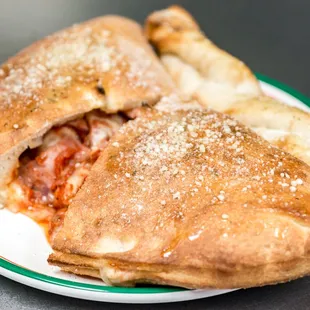 a piece of pizza on a plate