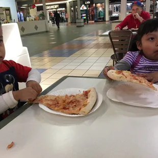 5.61 for two pizzas and they are full before they even finish the pizza.