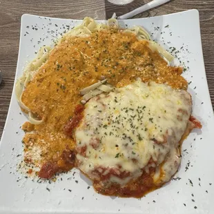 Italian Duo Parmigiana with stuffed mushroom sauce