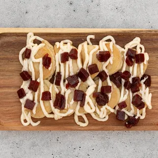 a pile of noodles on a cutting board