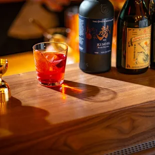 a shot of a drink on a bar counter