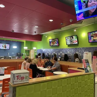 a group of people eating at a fast food restaurant