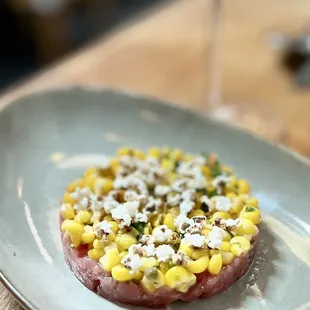 BLUEFIN TUNA TARTARE $16: PICKLED GREEN TOMATO, CRISPY FOCACCIA, EGG YOLK