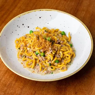 Gramigna, sausage ragu, english peas, parmigiano reggiano