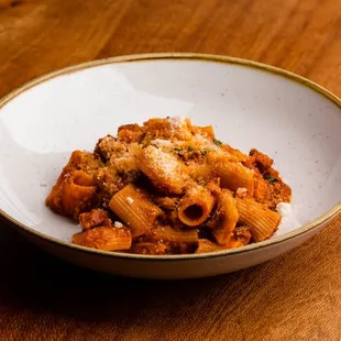 Rigatoni, ragu napoletano, parmigiano reggiano, basil