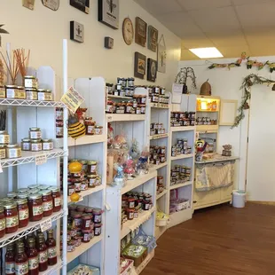 Wall of jellies, salsas, BBQ sauce, butters, and honeys.