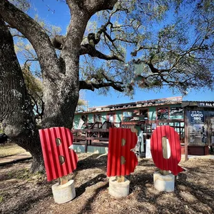 Big oak and lovely patio out front.