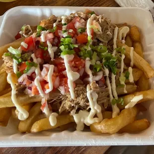 Adobo loaded fries
Shredded pork adobo with tomatoes, onions and garlic aioli