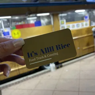 a person holding a business card