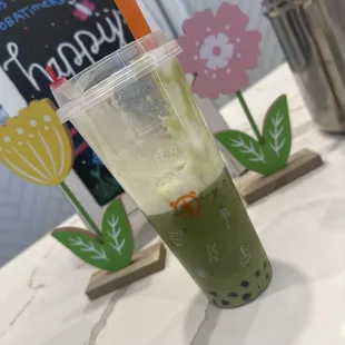 Milk foam jasmine matcha tea