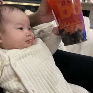 Peach strawberry tea with boba and lychee coconut jelly