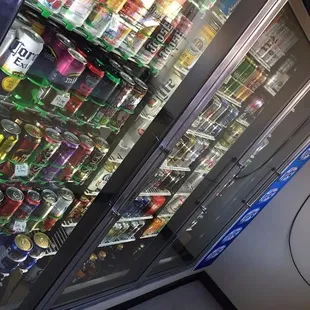 a refrigerator full of sodas