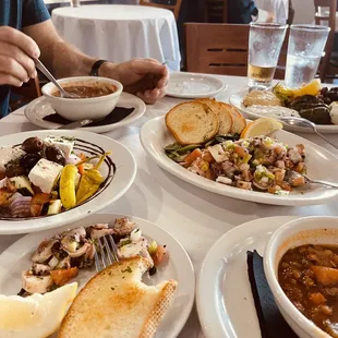 Soup, octopus salad,  cheese and olives
