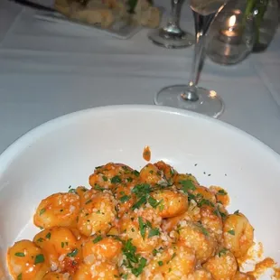 a bowl of pasta with shrimp