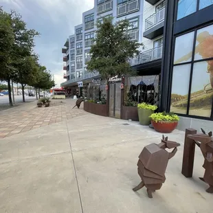 Outside entrance and seating along side the strip on the right side