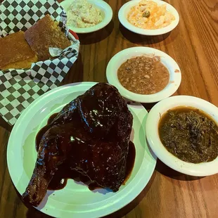 Half chicken collard greens black eye peas mac n cheese potato salad and cornbread.