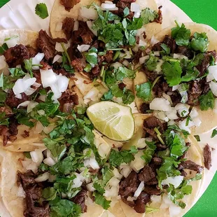 a taco on a paper plate