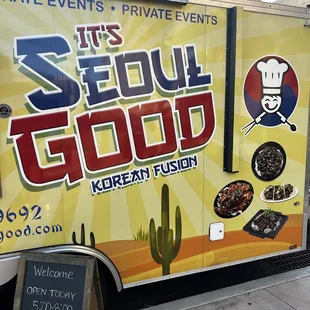 a food truck parked on the side of the road