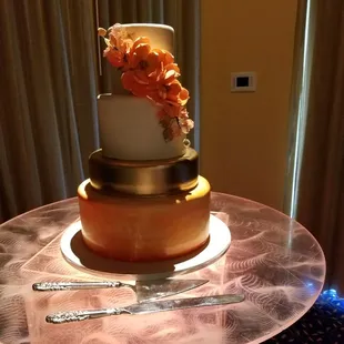 The cake was beautiful, tasty and it blended so well with our theme and colors