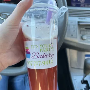 Strawberry tea with strawberry popping boba