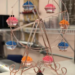 a ferris wheel with cupcakes