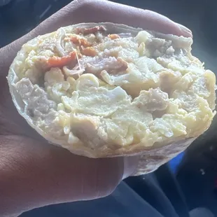 Breakfast burrito with Ham, Sausage, and bacon!!! A grown man gotta eat lol