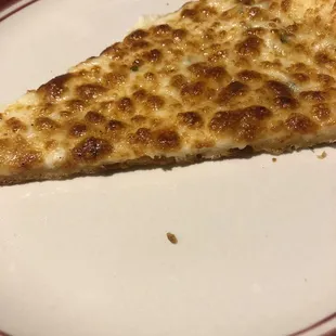 3 things needed for a cheese pizza.. dough, cheese, and SAUCE! There wasn&apos;t a drop of sauce.