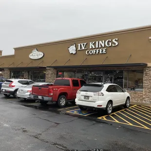 front of IV Kings Coffee (four kings)