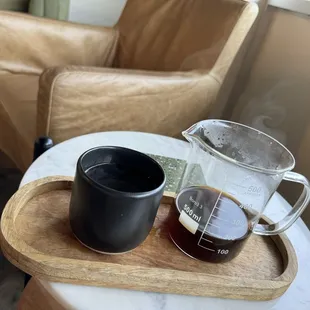 Coffee (comes in a beaker if you get it for &quot;here&quot;)