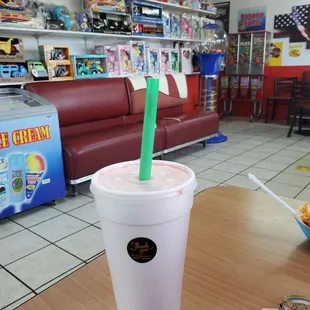 Enjoying a banana and strawberry shake