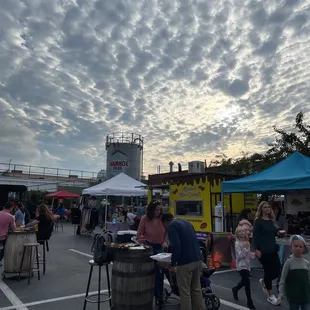 a crowd of people walking around