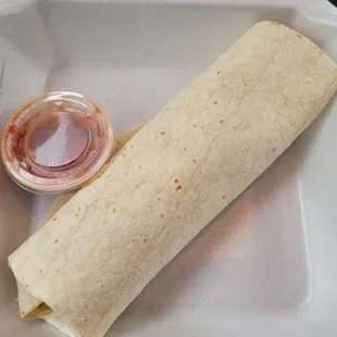 Breakfast burrito, tortilla not grilled like the menu states and missing the sour cream that the menu mentions