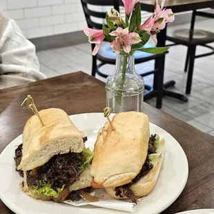 POT ROAST POBOY Slow-braised grass-fed chuck roast, caramelized onions, Provolone cheese, horseradish mayo, and au jus