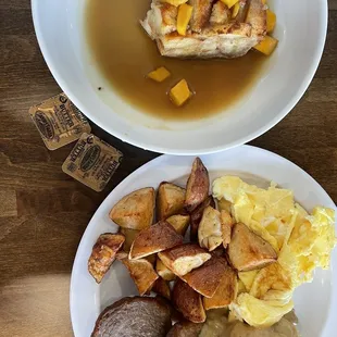 Breakfast platter with a  sweet biscuit bread pudding