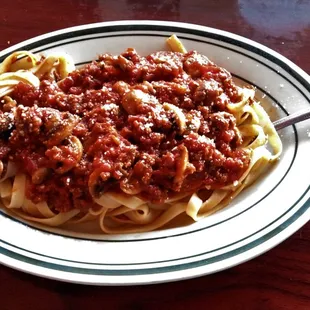 Fettucine with meat-mushroom sauce during lunch; the portion was satisfying and the sauce was rich and tasty.