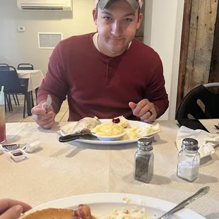 a man eating breakfast