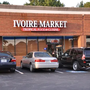 cars parked in front of the store