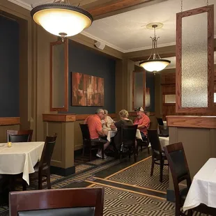 dining area with tables and chairs