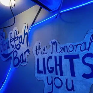 a neon sign that reads the memorial lights you