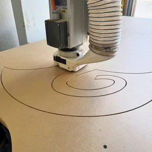 Our CNC hard at work cutting and engraving signs for our classes