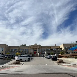 cars parked in front of the school