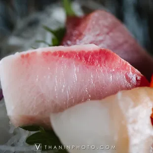 a close up of a plate of sushi