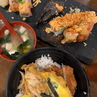 hand roll, hawaii volcano roll, miso soup, and chicken katsu don