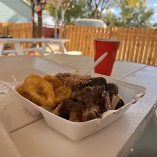 Jerk Chicken includes rice &amp; cabbage