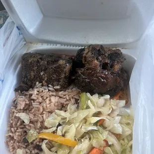 Oxtails includes rice &amp; cabbage