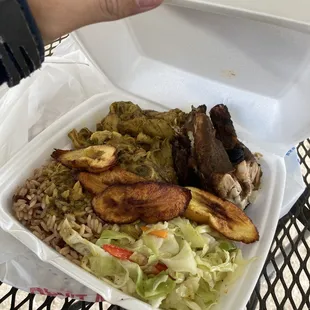 Jerk &amp; Curry half half plate. Devoured to the last rice