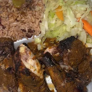 Jerk Chicken includes rice &amp; cabbage